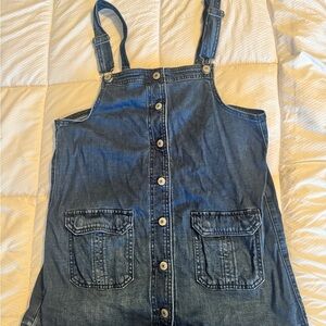 American Eagle Outfitters women's button up denim jumper with raw hem.